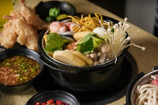 怡朗 SM City 的 Tong Yang Grill & Shabu-Shabu（怡朗 SM 城市购物中心的 Tong Yang 烧烤与日式涮涮锅））